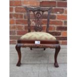 A REPRODUCTION MAHOGANY MINIATURE CHAIR