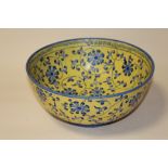 A MODERN CHINESE / ORIENTAL BLUE AND YELLOW FLORAL BOWL WITH ORANGE BACK STAMP, DIA. 30.5 CM