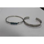 TWO STERLING SILVER BANGLES TO INCLUDE A TURQUOISE EXAMPLE APPROX WEIGHT 20.6G