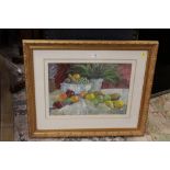 GILT FRAMED AND GLAZED PASTEL PICTURE OF A TABLE TOP STILL LIFE STUDY OF FRUIT AND FERNS - 47CM X