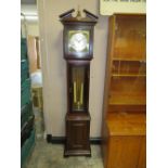 A MODERN MAHOGANY GRANDMOTHER CLOCK WITH TWO WEIGHTS AND PENDULUM