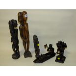 THREE WEST AFRICAN TRIBAL ART CARVED FIGURES AND TWO ASIAN FISHERMAN CARVINGS (5)