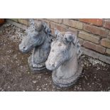 TWO HORSE HEAD GARDEN ORNAMENTS