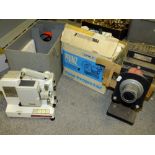 THREE VINTAGE PROJECTORS TO INCLUDE A MODEL 6 JOHNSON OPTOSCOPE AND NORRIS SUPER 200