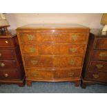 A 20TH CENTURY BOW FRONTED FOUR DRAWER CHEST H-85 W-79 CM