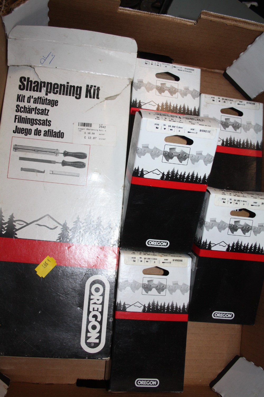 FIVE BOXED OREGON CHAINSAW CHAINS PLUS A SHARPENING KIT