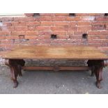 AN UNUSUAL 19TH CENTURY CARVED MAHOGANY DOUBLE SIDED BENCH, the plain two plank top supported by two