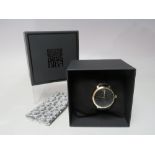 A NEW AND BOXED BIBA EMBLEM LOGO WATCH, watch Dia. approx 3.4 cm