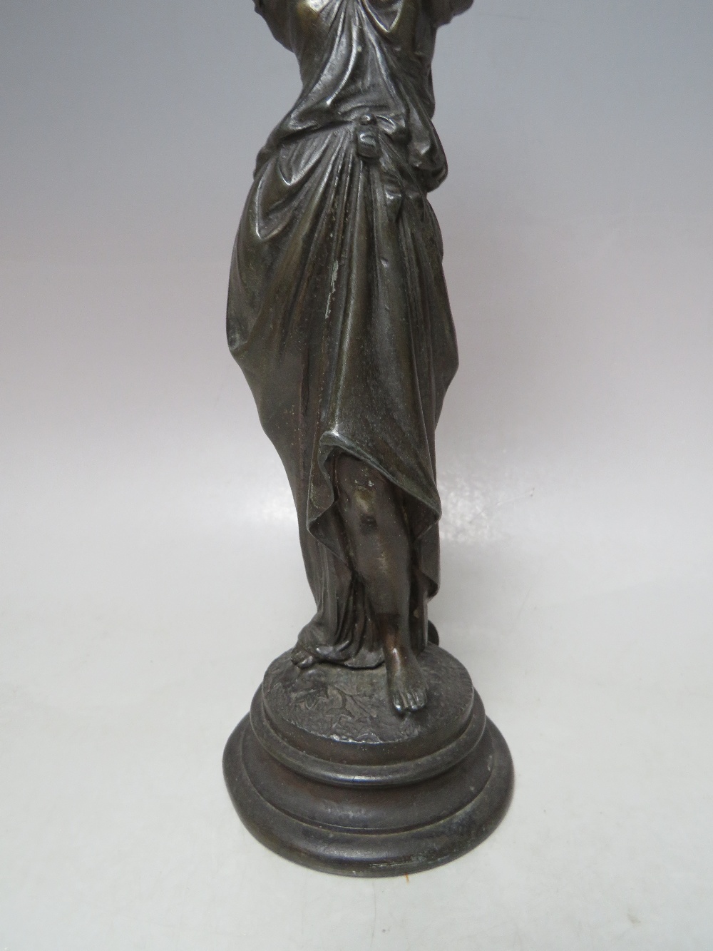 A VINTAGE BRONZE BAR GAS LIGHTER, in the form of a young woman in classical dress carrying an urn, H - Image 3 of 8