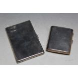 A TALL HALLMARKED SILVER CIGARETTE CASE, H 12.5 cm together with a shorter curved example, approx