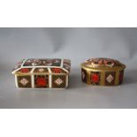 A ROYAL CROWN DERBY IMARI PATTERN RECTANGULAR LIDDED TRINKET BOX, together with a smaller Royal