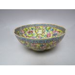 A CHINESE FINE PORCELAIN IMPERIAL YELLOW FAMILLE ROSE SCALLOPED BOWL, profusely decorated with