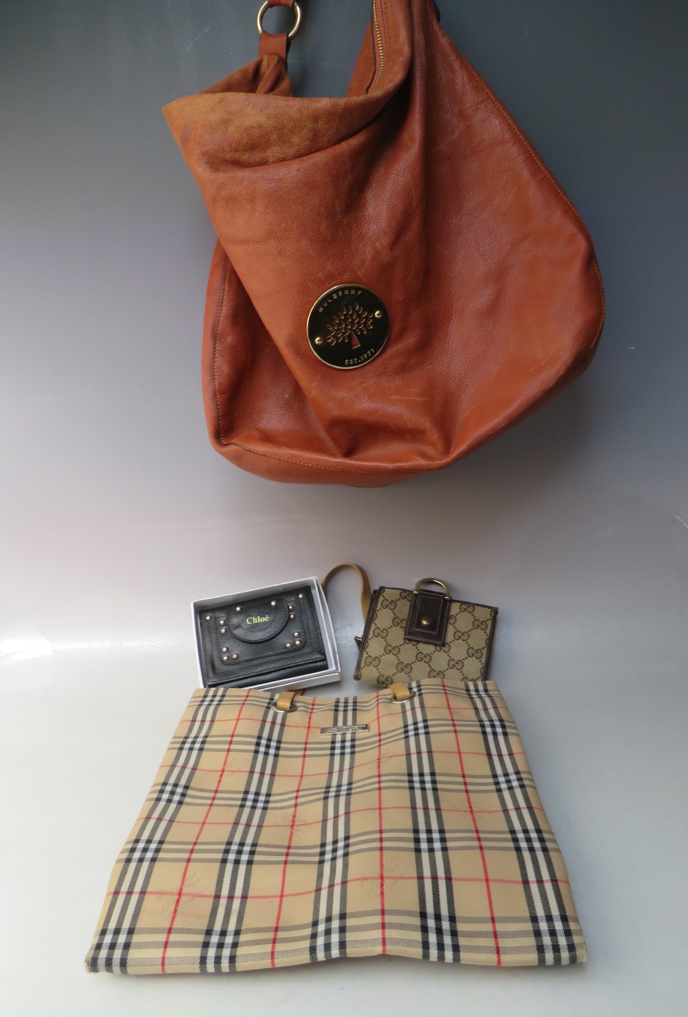 A COLLECTION OF DESIGNER STYLE LADIES BAGS ETC, comprising a Burberry small shopper, a Gucci