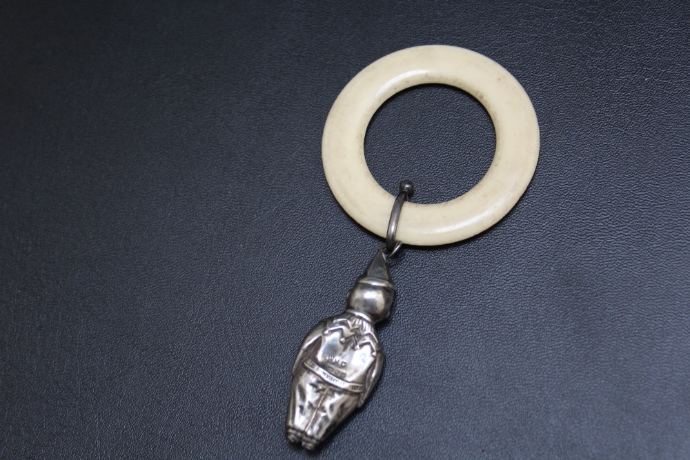 A NOVELTY HALLMARKED SILVER AND IVORY BABY'S TEETHING RING AND CLOWN RATTLE BY W H CARRINGTON & CO - - Image 2 of 3