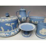 FIVE ITEMS OF WEDGWOOD BLUE AND WHITE JASPERWARE, comprising a coffee pot, circular bowl, small