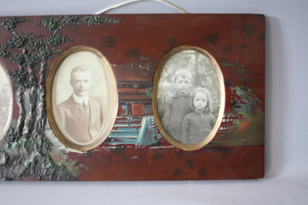 A VINTAGE PAINTED DECORATIVE LACQUERED FRAME, with part decorated in relief and three oval - Image 3 of 4