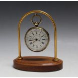 A 'TELL' CENTRE SECONDS POCKET WATCH CHRONOMETER ON STAND, H 13 cm