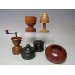 A COLLECTION OF TREEN ITEMS, various styles and periods, to include a pepper / spice grinder etc. (