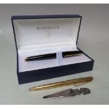 A CASED WATERMAN INK PEN, black body with 18K/750 gold nib, together with a gold plated Parker