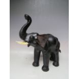 A LIBERTY STYLE LEATHER ELEPHANT, H 40 cm, L 41 cm