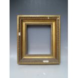 A 19TH CENTURY GOLD FRAME WITH EGG AND DART DESIGN TO OUTER EDGE, frame W 9 cm, rebate 30 x 26 cm