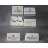 A COLLECTION OF SIX CERAMIC NAME PLAQUES, for Minton, Royal Doulton x 2, Royal Albert, Royal Osborne