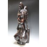 A LARGE CARVED HARDWOOD TRIBAL FIGURE OF A FEMALE BUST WITH DECORATIVE INLAY, H 59 cm
