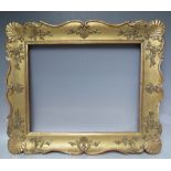 A LATE 18TH / EARLY 19TH CENTURY GOLD DECORATIVE FRAME, with corner embellishments, frame W 8 cm,