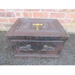 A LATE 18TH / EARLY 19TH CENTURY CAST IRON STRONG BOX, with lion panelled decorations, with key, W