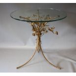 A VINTAGE METAL AND WIREWORK ORNATE TABLE BASE, with later glass top, H 53 cm, glass Dia 50 cm