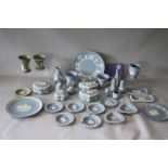 A COLLECTION OF WEDGWOOD BLUE AND WHITE JASPERWARE, comprising a selection of lidded trinket pots,