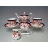 A ROYAL CROWN DERBY PORCELAIN 'TEA FOR TWO' BREAKFAST SET, comprising a teapot, jug, sugar bowl, two