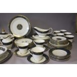 A LARGE COLLECTION OF ROYAL DOULTON 'CARLYLE' PATTERN TEA AND DINNERWARE, comprising 8 cups, 8