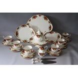 A SELECTION OF ROYAL ALBERT OLD COUNTRY ROSES FINE BONE CHINA TEAWARE, comprising a smaller tea pot,