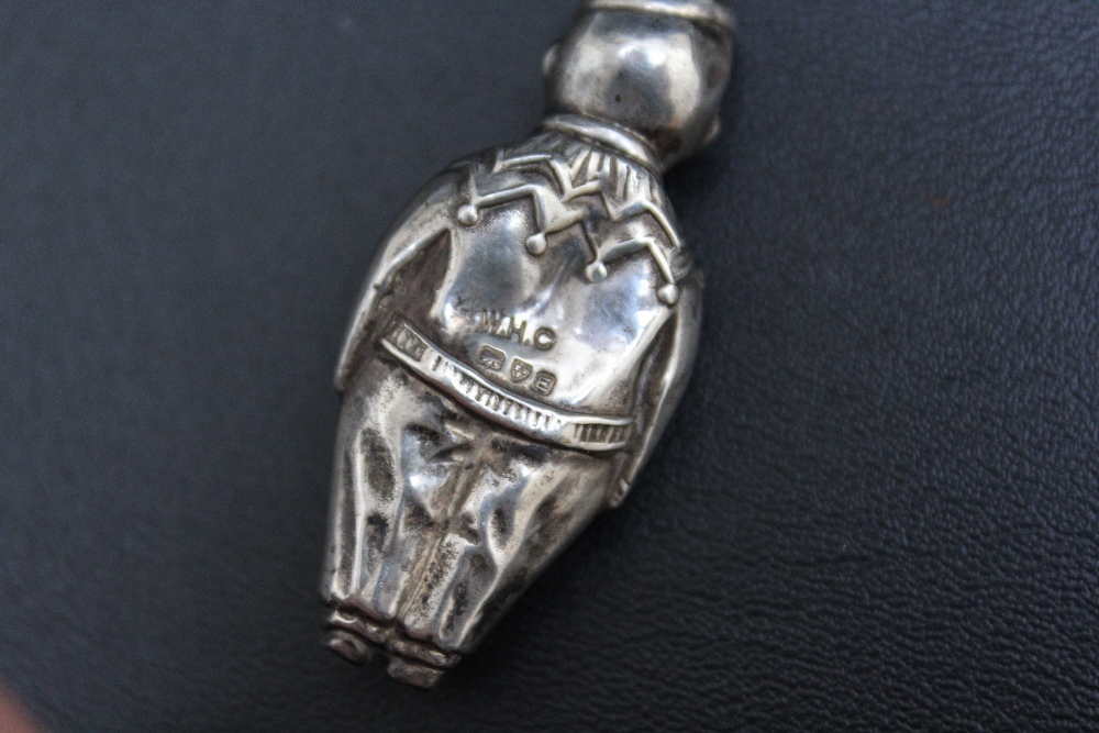 A NOVELTY HALLMARKED SILVER AND IVORY BABY'S TEETHING RING AND CLOWN RATTLE BY W H CARRINGTON & CO - - Image 3 of 3