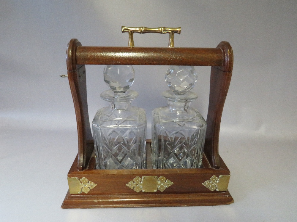 A TWENTIETH CENTURY MAHOGANY TWO DECANTER TANTALUS, with key, W 33 D 17 H 30 cm - Image 5 of 6