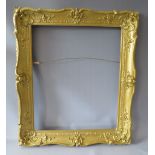 A 19TH CENTURY GOLD SWEPT FRAME, with some restoration, frame W 8 cm, rebate 63 x 51 cm