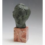 A SMALL BRONZE BUST ON MARBLE BASE, signed Yuki, H 15 cm