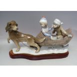 A LARGE LLADRO GROUP FIGURE 'SLEIGH RIDE' 5037, modelled as two children aboard a sleigh pulled by a