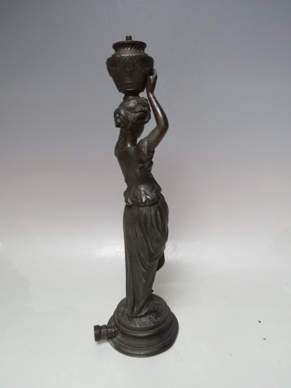 A VINTAGE BRONZE BAR GAS LIGHTER, in the form of a young woman in classical dress carrying an urn, H - Image 5 of 8