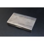 A SLIM CONTINENTAL SILVER SNUFF BOX, stamped 800, approx weight 57.8g, W 7.25 cm