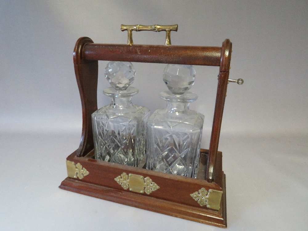 A TWENTIETH CENTURY MAHOGANY TWO DECANTER TANTALUS, with key, W 33 D 17 H 30 cm - Image 3 of 6