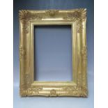 A LATE 18TH / EARLY 19TH CENTURY GOLD SWEPT FRAME, with some restoration, frame W 10 cm, rebate 43 x