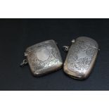 TWO HALLMARKED SILVER VESTA CASES, the taller being a Chester 1919 example, H 5 cm