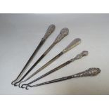 A COLLECTION OF FIVE SILVER HANDLED BUTTON HOOKS, various marks and makers, longest L 29.5 cm