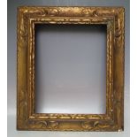 A LATE 19TH / EARLY 20TH CENTURY DECORATIVE GOLD FRAME, frame W 9 cm, rebate 43 x 35 cm