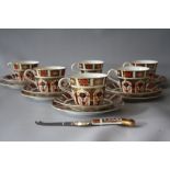 A SET OF SIX ROYAL CROWN DERBY IMARI PATTERN 1128 TRIOS, all marked as seconds, plate Dia. 16 cm,