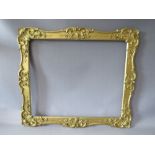 A 19TH CENTURY GOLD SWEPT FRAME, with some restoration, frame W 7 cm, rebate 62 x 52 cm