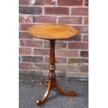A 19TH CENTURY OAK PEDESTAL TABLE, the circular fixed top supported on a slender turned column and