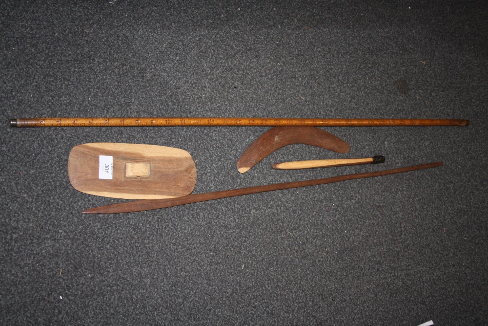 AN ABORIGINAL SPEAR, MINIATURE CLUB, SHIELD AND BOOMERANG, TOGETHER WITH A YARD STICK (5)